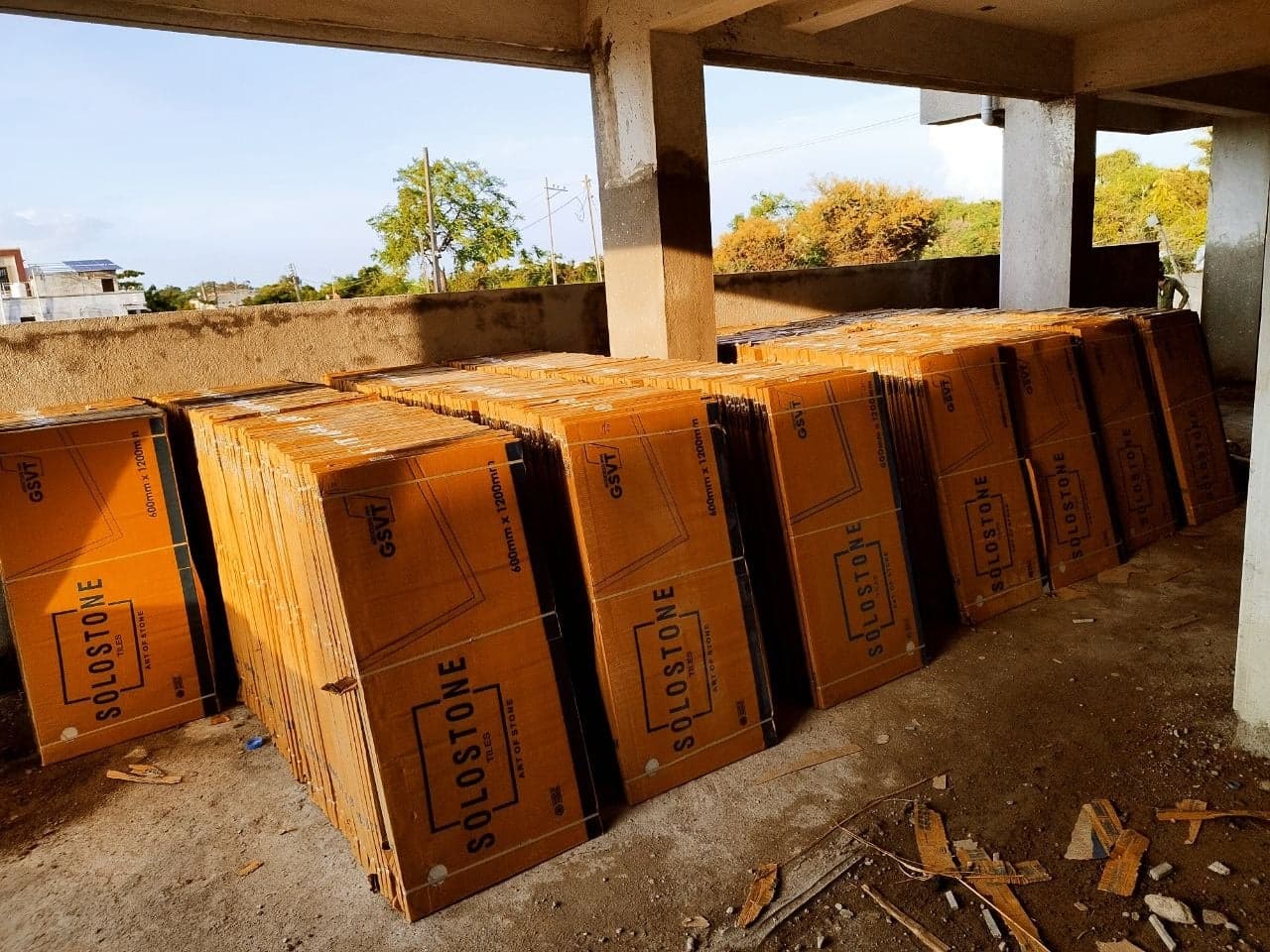 600 × 1200 mm floor tile boxes delivered to site